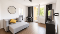 Wohnzimmer - Charmante 1-Zimmer-Wohnung im Herzen von Berlin-Kreuzberg